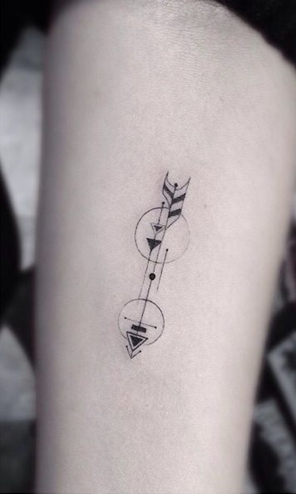 simple small arrow tattoo on arm